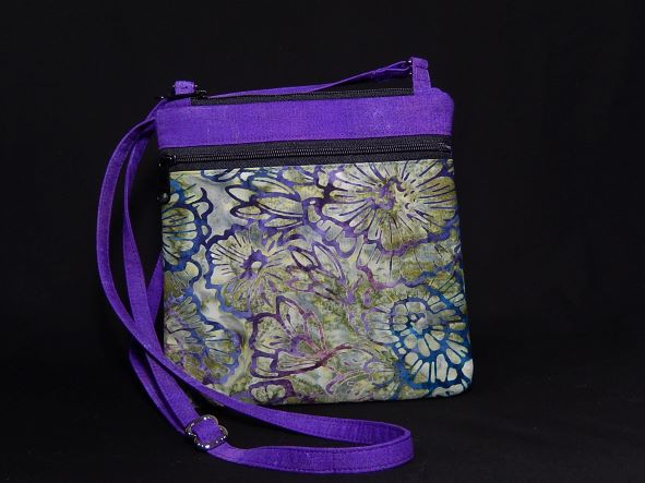 Handbag with Purple Shoulder Strap and Multiple Flower Patterns